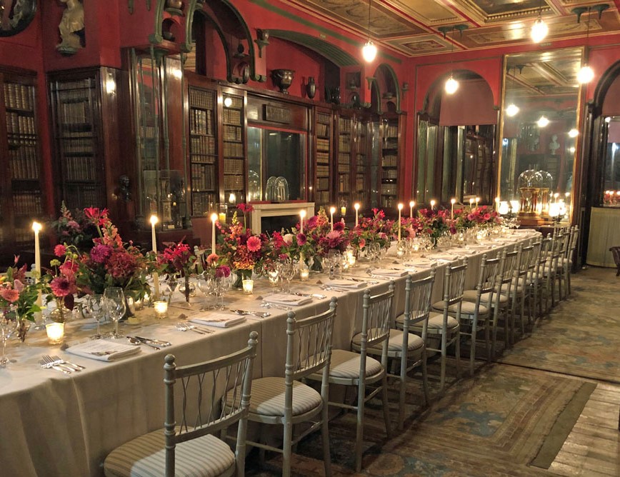Dinner table with flowers at Sir John Soane's Museum