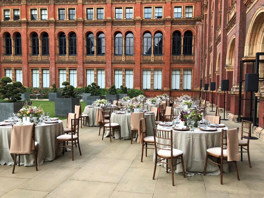Pretty dinner tables in the John Madejski Garden at the V&A Museum