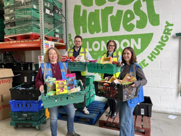 Clare and Hugo delivering Easter eggs to city harvest